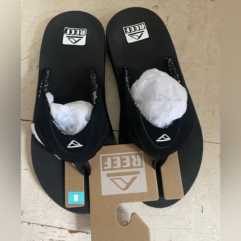 Reef Fanning flip flops